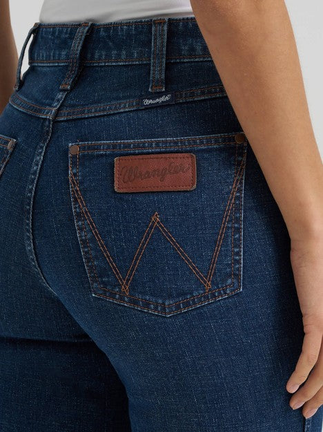 Wrangler women's Jolie Retro high rise Bailey bootcut jeans in blue denim with classic five-pocket styling