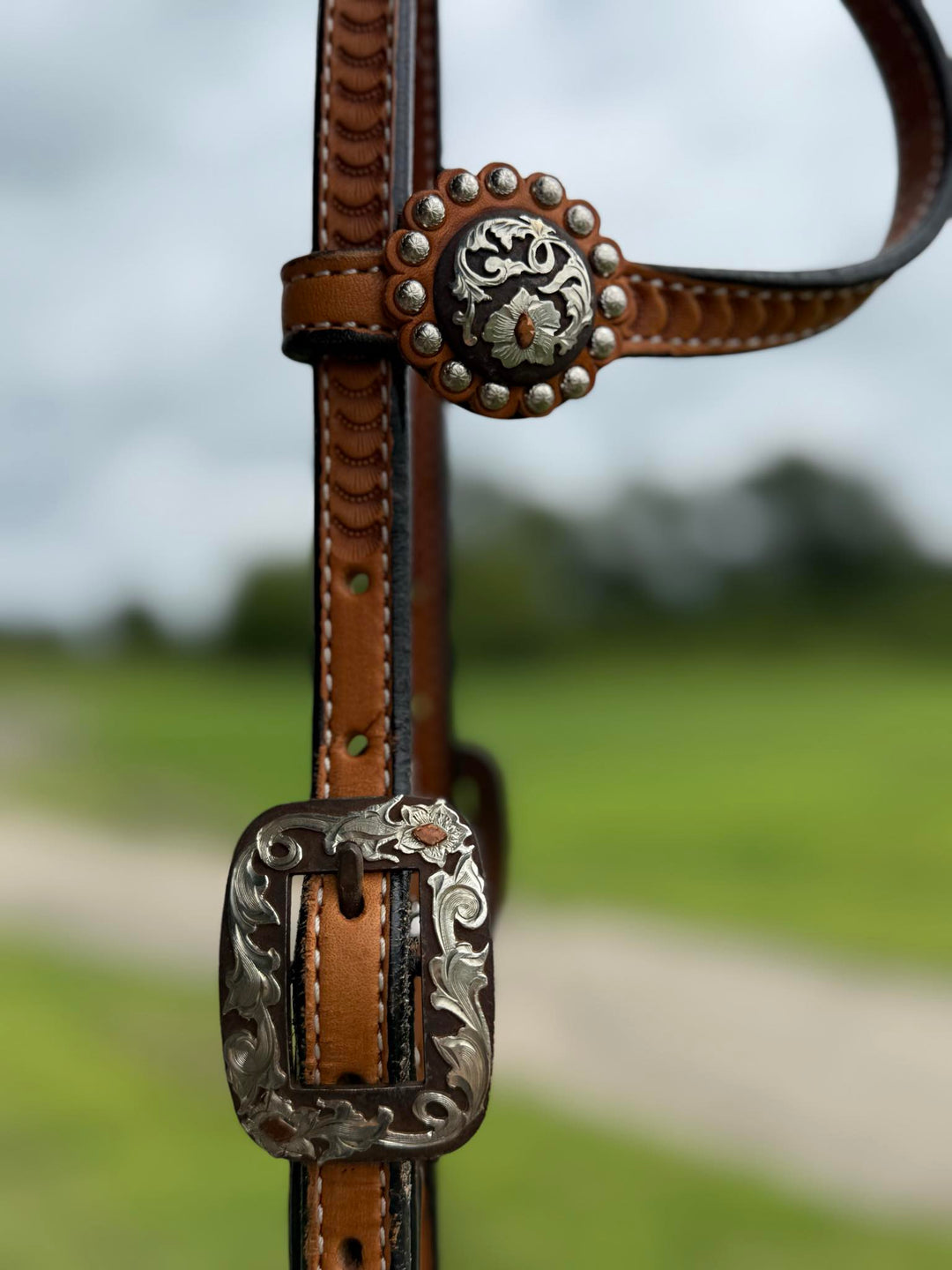 Cowperson Tack Light Oiled Floral Tooled One Ear Headstall