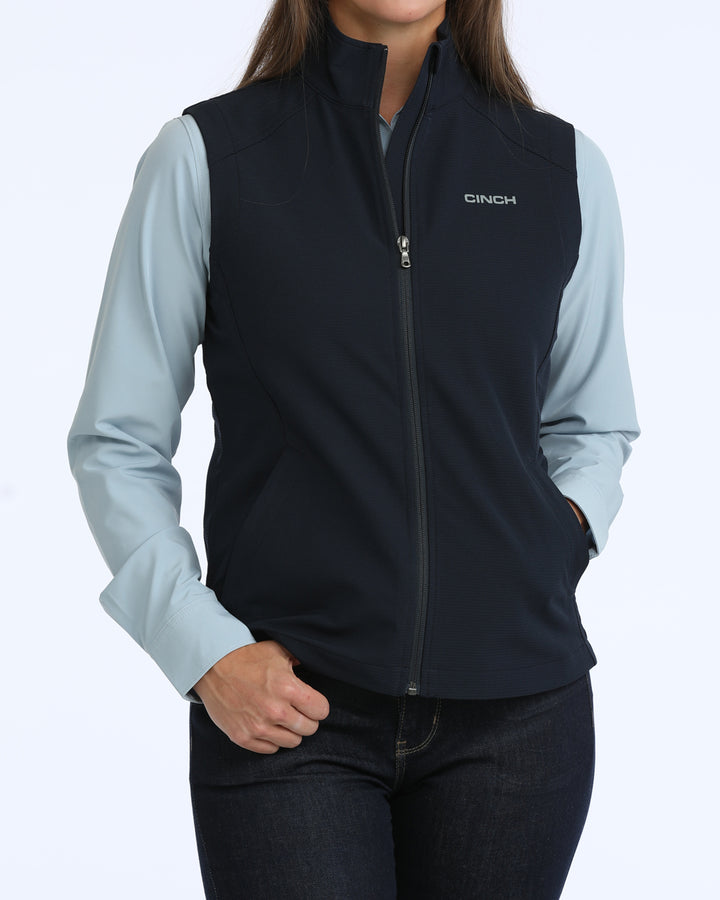 Cinch Women's navy windproof vest with front zipper, stylish western wear for women, lightweight and functional outdoor apparel.