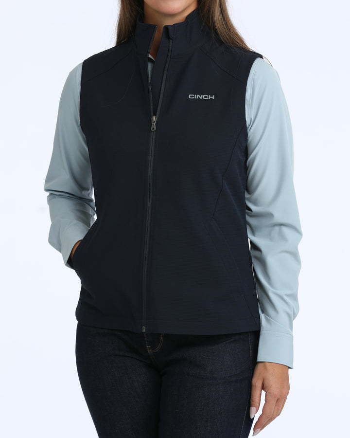 Cinch women's navy windproof vest for western wear, lightweight jacket with front zipper and collar, casual outdoor style.