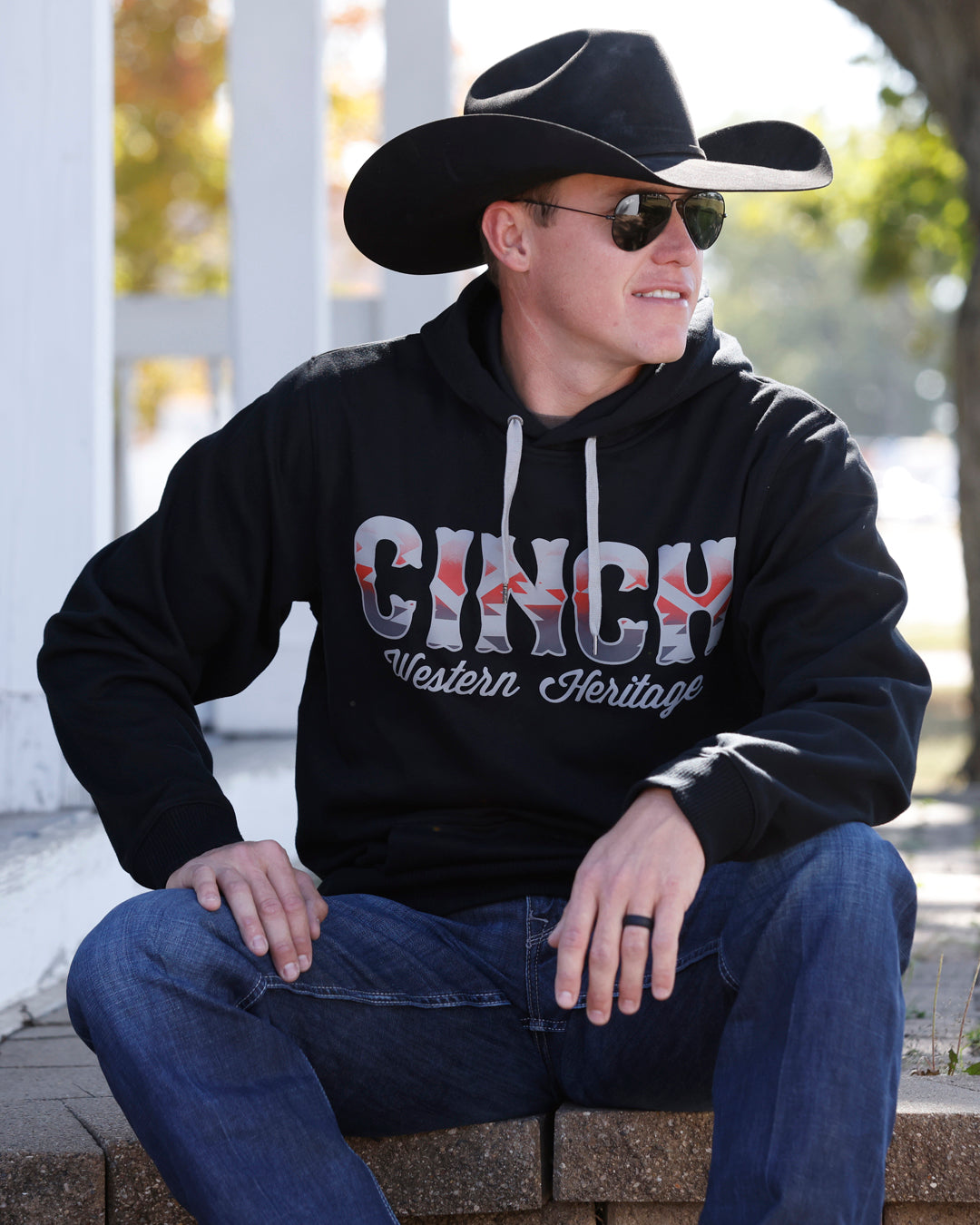 Cinch men's black Aztec printed logo hoodie with Western-inspired design, casual fit, and front pocket.